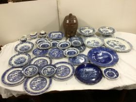 A collection of blue & white ceramics - a pair of oriental style tureens & covers, willow pattern,