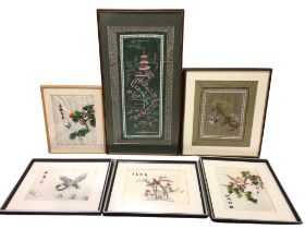A set of three framed Chinese silkwork embroidery pictures of birds; two other oriental floral