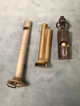 A Victorian turned ebony and boxwood pea whistle; an Acme brass double panpipe whistle; and a nickel