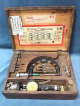 An American maple boxed Starrett micrometer caliper set, the fitted case with instructions to