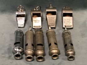 Five general service whistles, three stamped ARP, four by J Hudson & Co, one Acme; and four pea