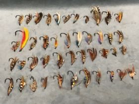 A box of vintage sea trout and salmon flies, several with gut eyes. (A lot)