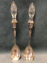 A pair of halmarked silver salad servers with cut glass handles - Baker Brothers, Chester 1909. (