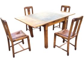 A deco oak draw-leaf dining table, the top with two leaves above a plain apron, raised on square