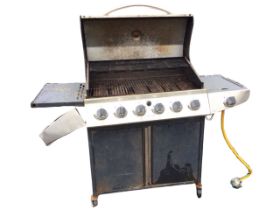 A garden gas barbecue cooker, the domed hinged hood enclosing burners with side heating plate,