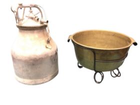 A Victorian brass jam pan with rolled rim and riveted scrolled handles, mounted on later wrought