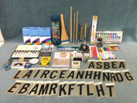 Miscellaneous art materials including boxed paint sets, glue, pencils, paintbrushes, inks, rulers,