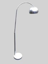 A chrome deco style standard lamp, the bowl shaped shade on column, with arched support, above