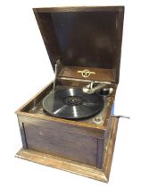 An oak cased Columbia gramophone with Semple & Fergusson, Dumfries label, with crank action and