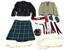 A Highland formal dress outfit - a 34in tartan kilt, a sporran, a kilt pin, a buckled belt, adress