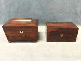 A nineteenth century rosewood tea caddy of sarcophagus form with moulded tablet to hinged cover,