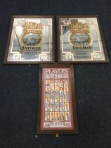 A pair of Hansa Heritage brewery mirrors - 17.5in x 23.75in; and a framed collectors set of 25