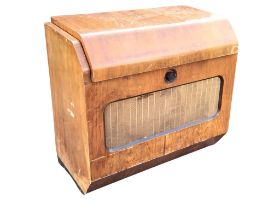 A 50s mahogany cased Ferguson radiogram, the sloped lid to cabinet enclosing turntable, radio dial &