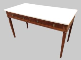 An Edwardian mahogany marble topped side table, the rectangular chamfered carrara slab above two