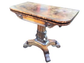 A George IV goncalo alves turn-over-top tea table, the rounded rectangular twin top above a frieze