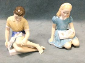 A pair of Royal Doulton children figurines from 1959 & 1961, Alice and Treasure Island, the boy