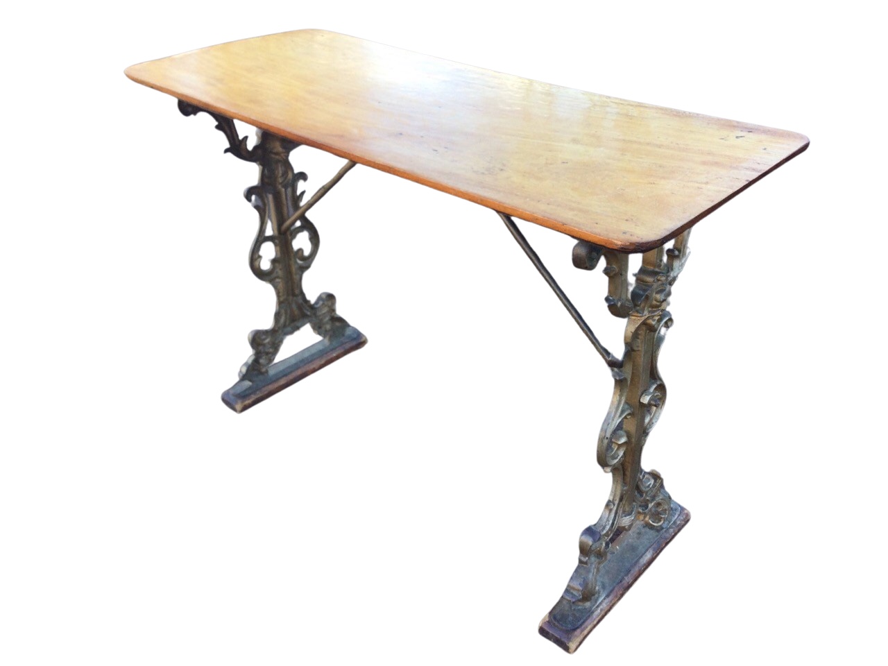 A Victorian mahogany and cast iron conservatory table, the rectangular top above pierced scroll cast