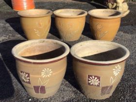 Five stoneware salt glazed garden tubs with scrafito decoration to sides, having moulded rims. (24.