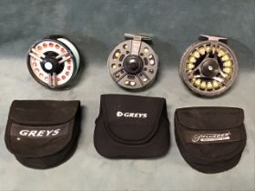 Two Greys GRX cased 4.25in salmon fly reels, complete with lines; and a Greys 4.5in GTS 900 salmon