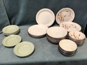 A Midwinter stoneware oven-to-table dinner service decorated on the Wild Oats pattern; and a set