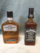 A bottle of Jack Daniels Old No 7 Tennessee whiskey - 40% proof and 70cl; and a Jack Daniels 70cl