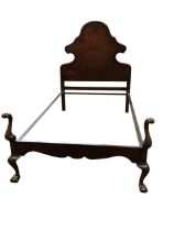 A Queen Anne style 4ft burr walnut bed with angleiron sides, with shaped and moulded headboard,