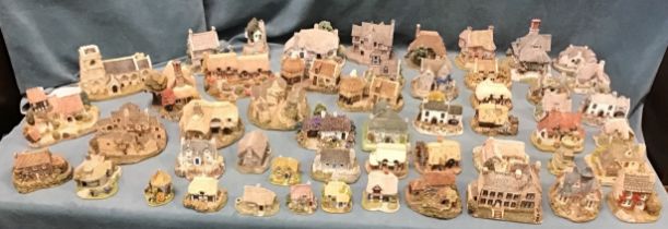 A collection of fifty-two Lilliput Lane handpainted house models forming a village - mainly from the