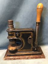 A Victorian cast iron seal press by Alex Kirkwood & Son of Edinburgh, with gilt decoration to