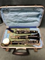 A cased Bosey & Hawkes cased clarinet, the Regent model with cleaning accessories. (A/F)