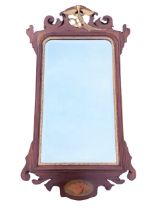 A C19th Georgian style mahogany mirror, the pierced scroll carved fretwork crest with central gilt