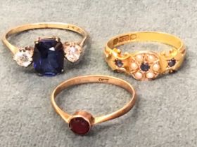 A Victorian 15ct gold sapphire and seed pearl ring in the original shell shaped leather box; a boxed