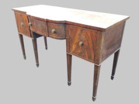 A C19th mahogany breakfront sideboard, the shaped top above a central bowed ebony strung drawer with