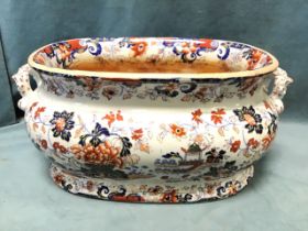 A Victorian ironstone footbath decorated in the Japanese Amherst pattern, the rounded bulbous