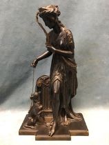 A C19th French bronze by Jean-Louis Grégoire, the classically robed Artemis and her hound on a chain