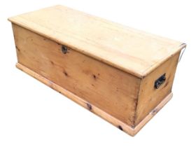 A Victorian pine blanket box, the rectangular top opening on iron strap hinges enclosing interior