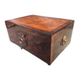 A Victorian mahogany crossbanded box framed by ebony stringing, the lined interior with divisions,