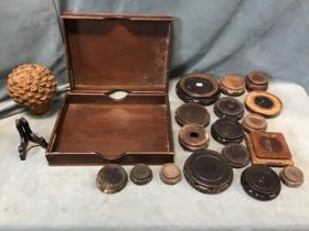 Two Edwardian rectangular mahogany trays; a natural seed pod encrusted finial; and eighteen