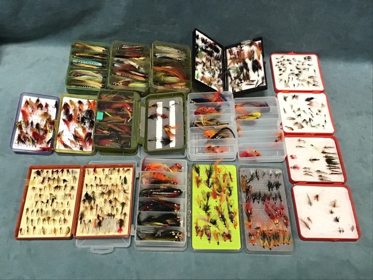 Fifteen fly boxes full of flies - mainly salmon including coneheads, waddingtons, tube flies, some