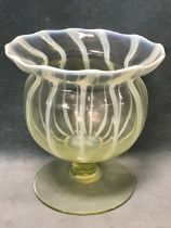 A Victorian opaline glass vase in the manner of James Powell & Sons, the ribbed globular body with