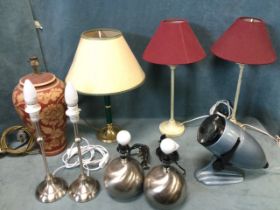 A deco Gnome magnifying slide lamp on adjustable cast stand; a pair of painted metal column