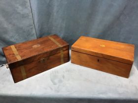 A Victorian walnut writing box with brass military style banding, the interior with pen tray &