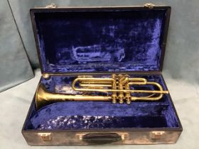 A cased German made brass trumpet, the Lafleur Special made for Boosey & Hawkes of London, with