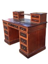 A Victorian satinwood crossbanded mahogany desk, the top with leather skiver and twin two-drawer