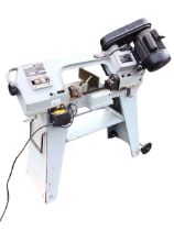A Sealey horizontal cutting band saw with 370w electric motor, and adjustable blade on trolley style