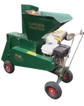 A Globe Garden Master wood chipper/shredder with a Honda GX 9hp engine on steerable pneumatic tyres,