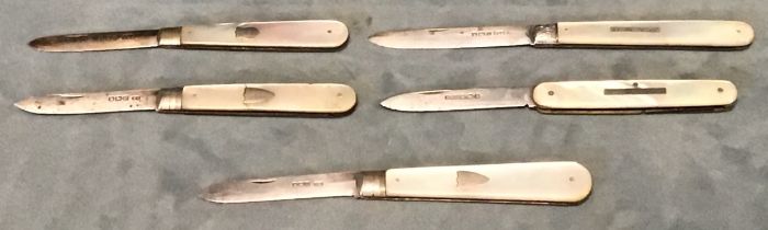 Five Sheffield hallmarked silver folding penknives with mother-of-pearl handles. (5)