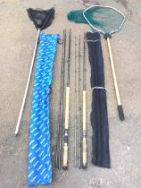A Daiwa WTF-13 Tournament Osprey Whisker kevlar 13ft salmon fly rod with sleeve; a Daiwa CF98-14