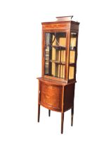 An Edwardian mahogany satinwood banded display cabinet, the rectangular top with raised back above a