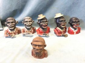 Six cast novelty blackman money boxes in original paint with rolling eyes and hinged arms - two cast