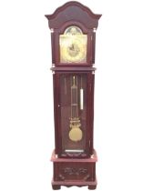 An Emperor mahogany longcase clock, the arched cornice above a dial with circular roman chapter